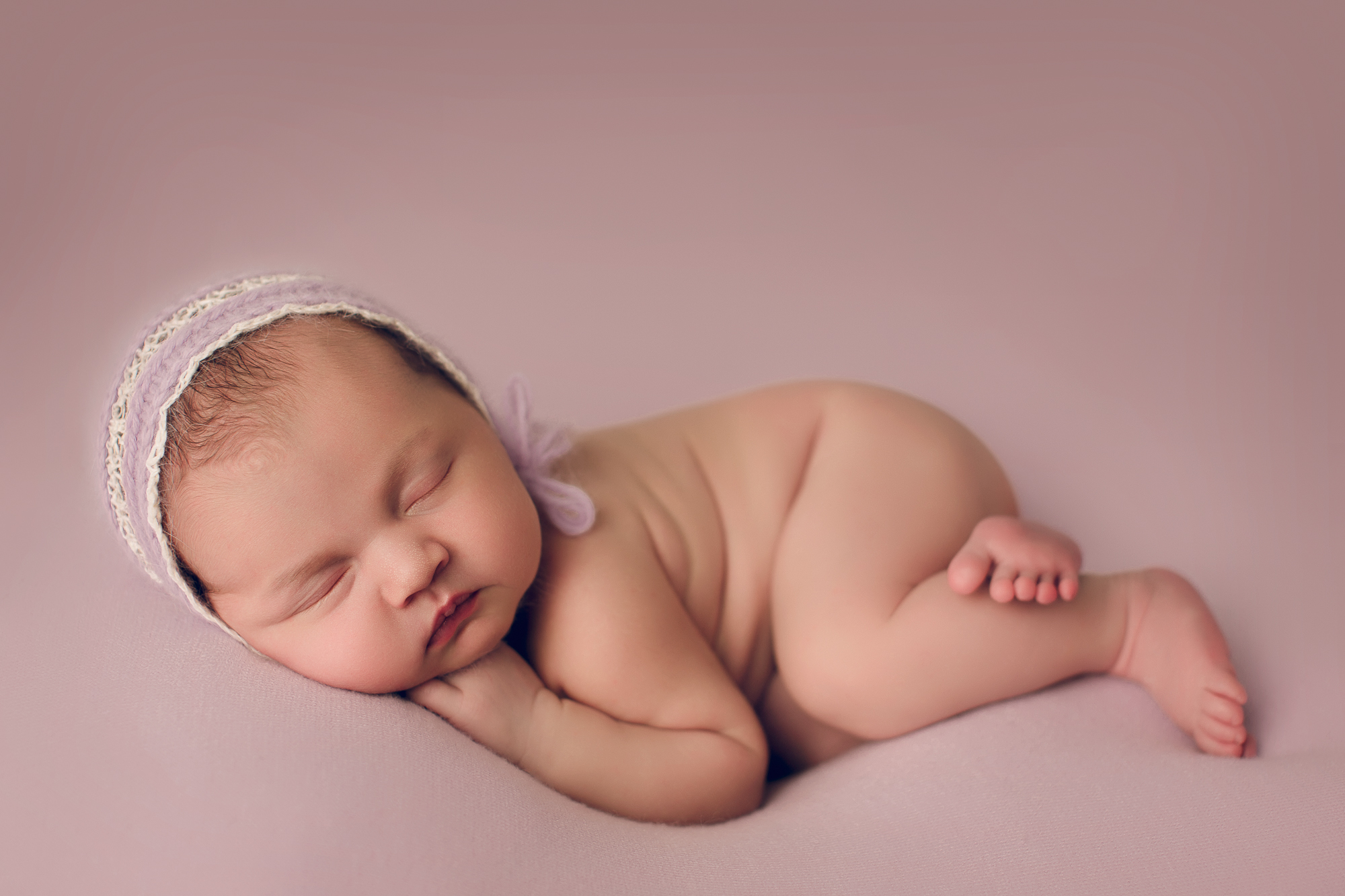 Adelaide Newborn photographer photo of a newborn baby.