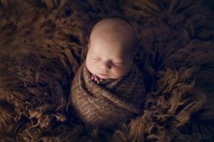 Adelaide Newborn photographer photo of a newborn baby.