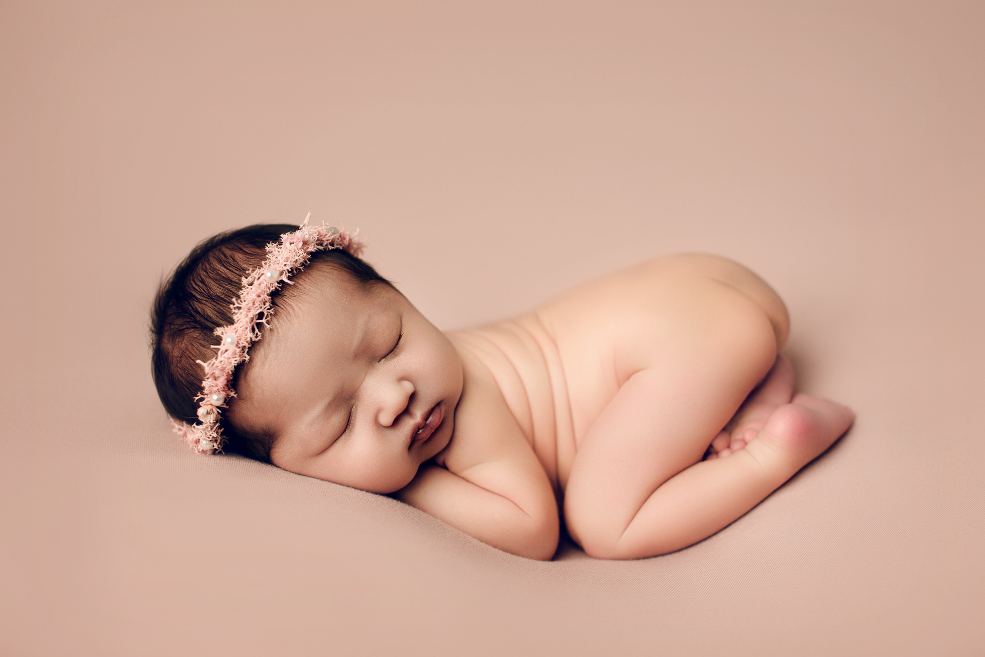 Adelaide Newborn photography photo of a newborn baby girl.