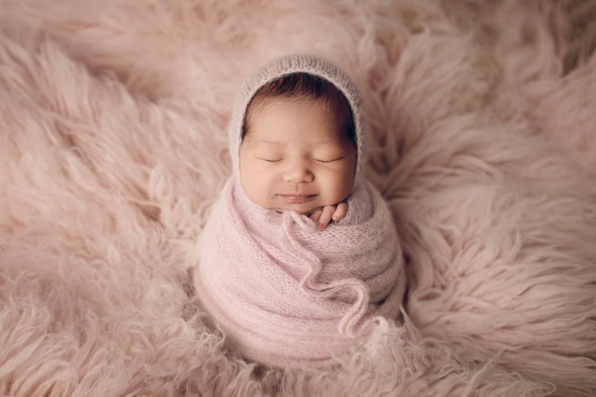 Adelaide Newborn photography photo of a newborn baby girl.