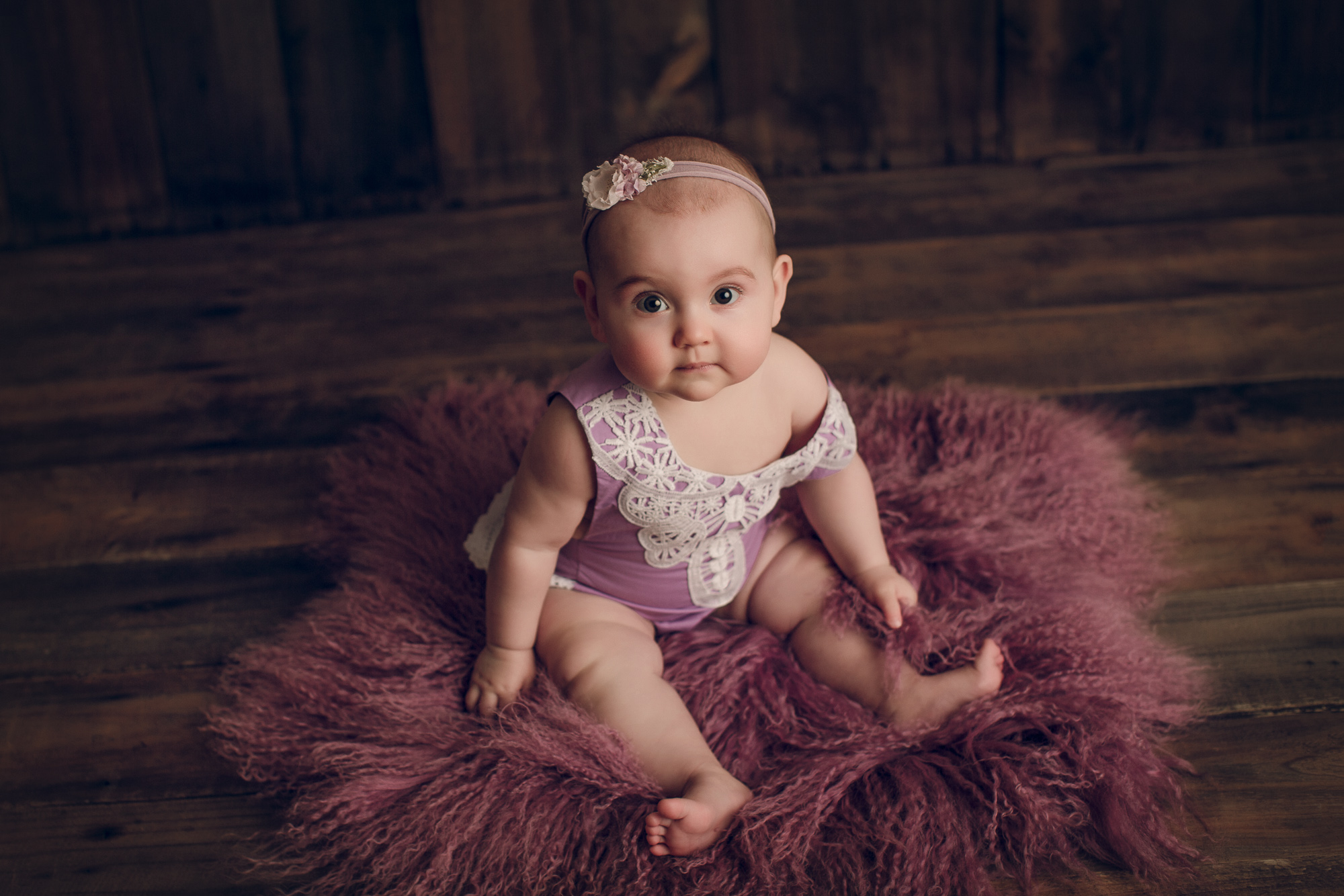 Adelaide newborn baby photographer's photo of an 8 month old baby girl.