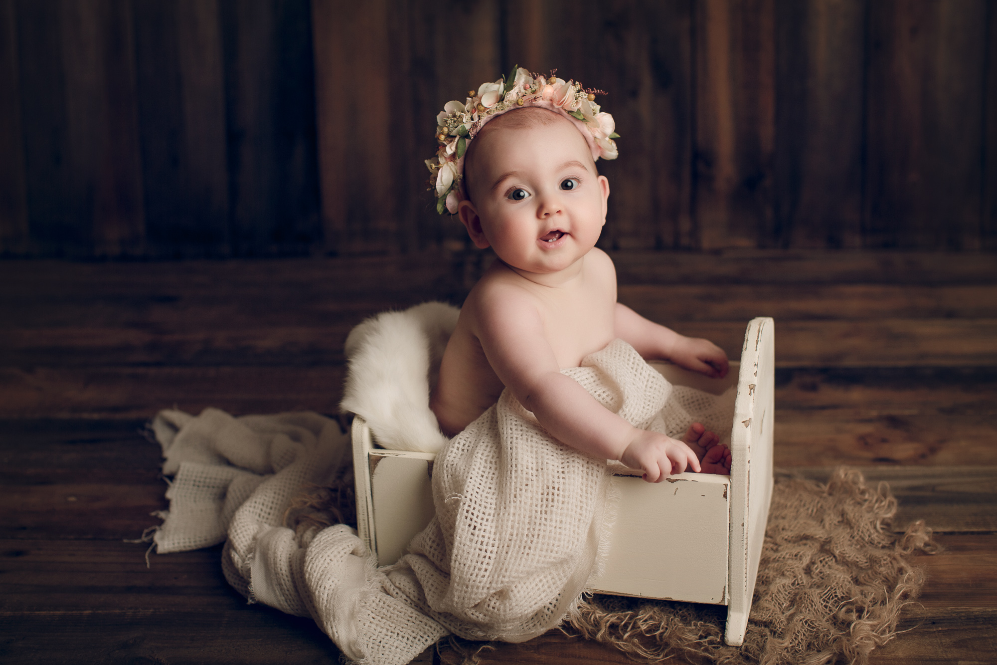 Adelaide newborn baby photographer's photo of an 8 month old baby girl.