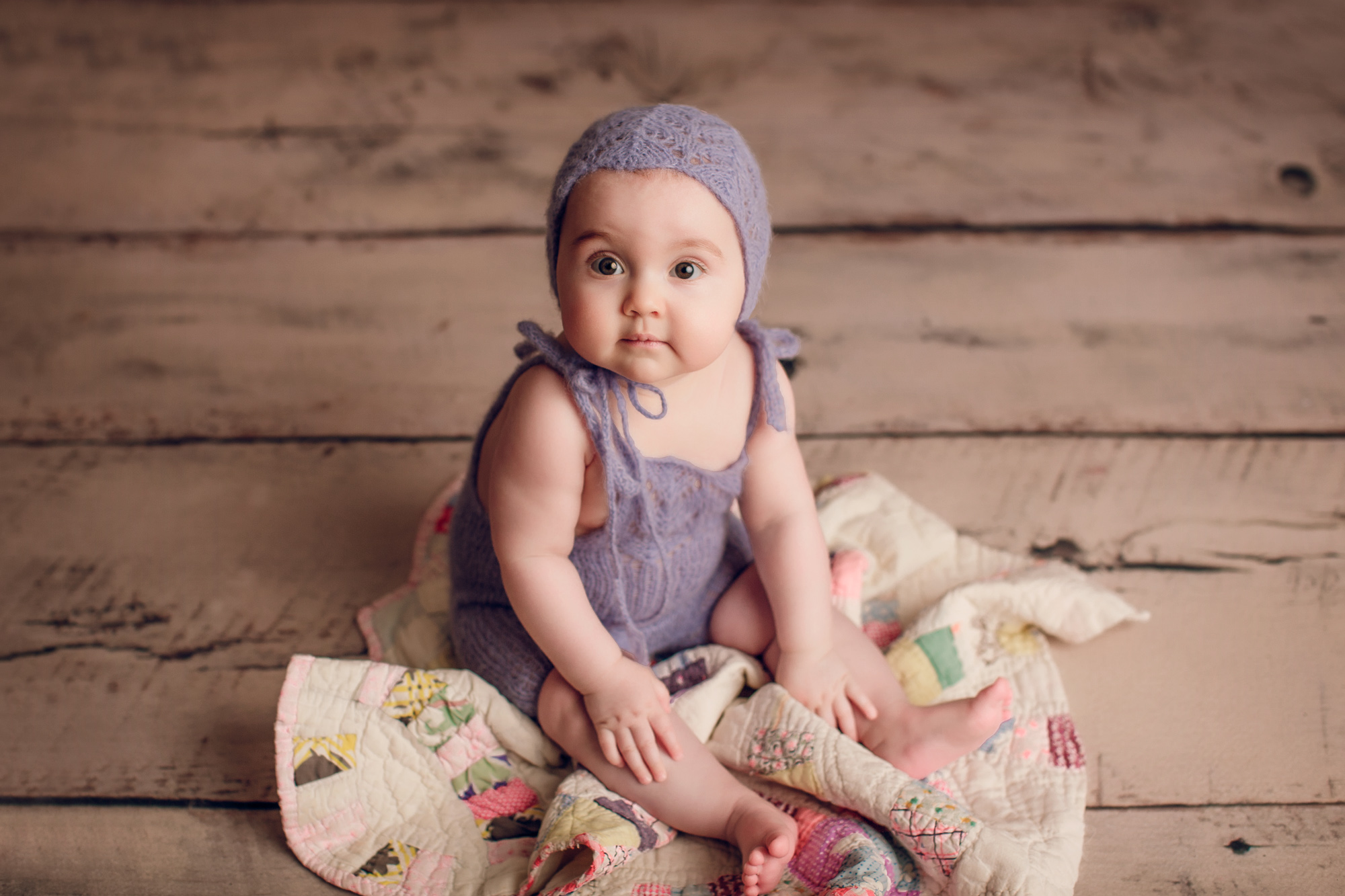 Adelaide newborn baby photographer's photo of an 8 month old baby girl.