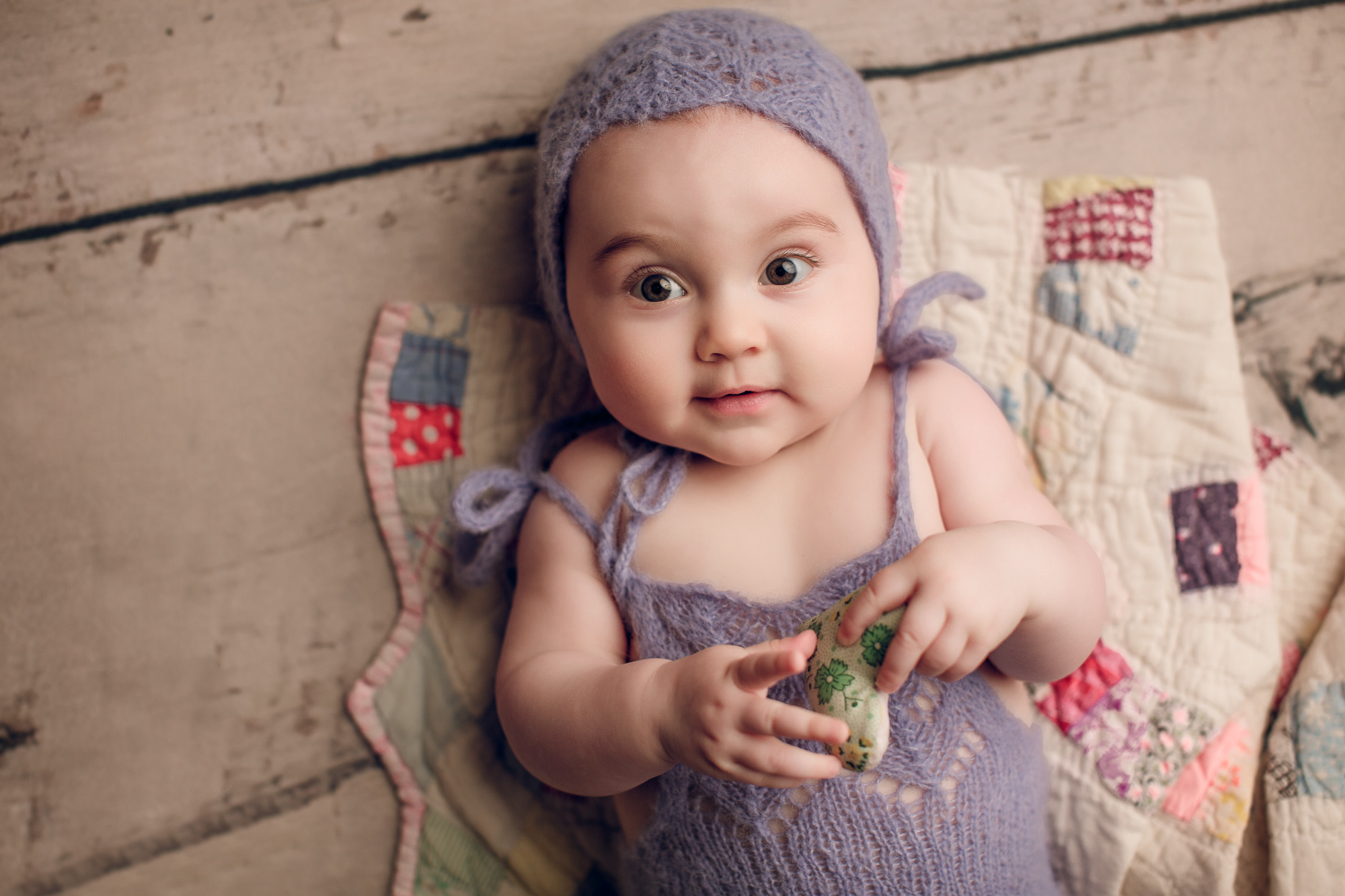 Adelaide newborn baby photographer's photo of an 8 month old baby girl.