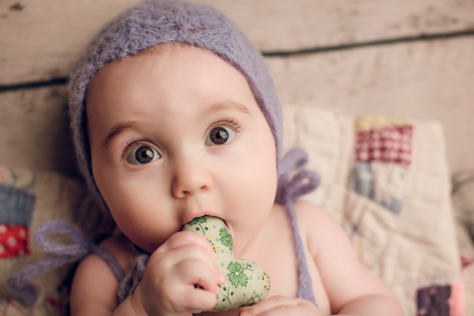 Adelaide newborn baby photographer's photo of an 8 month old baby girl.