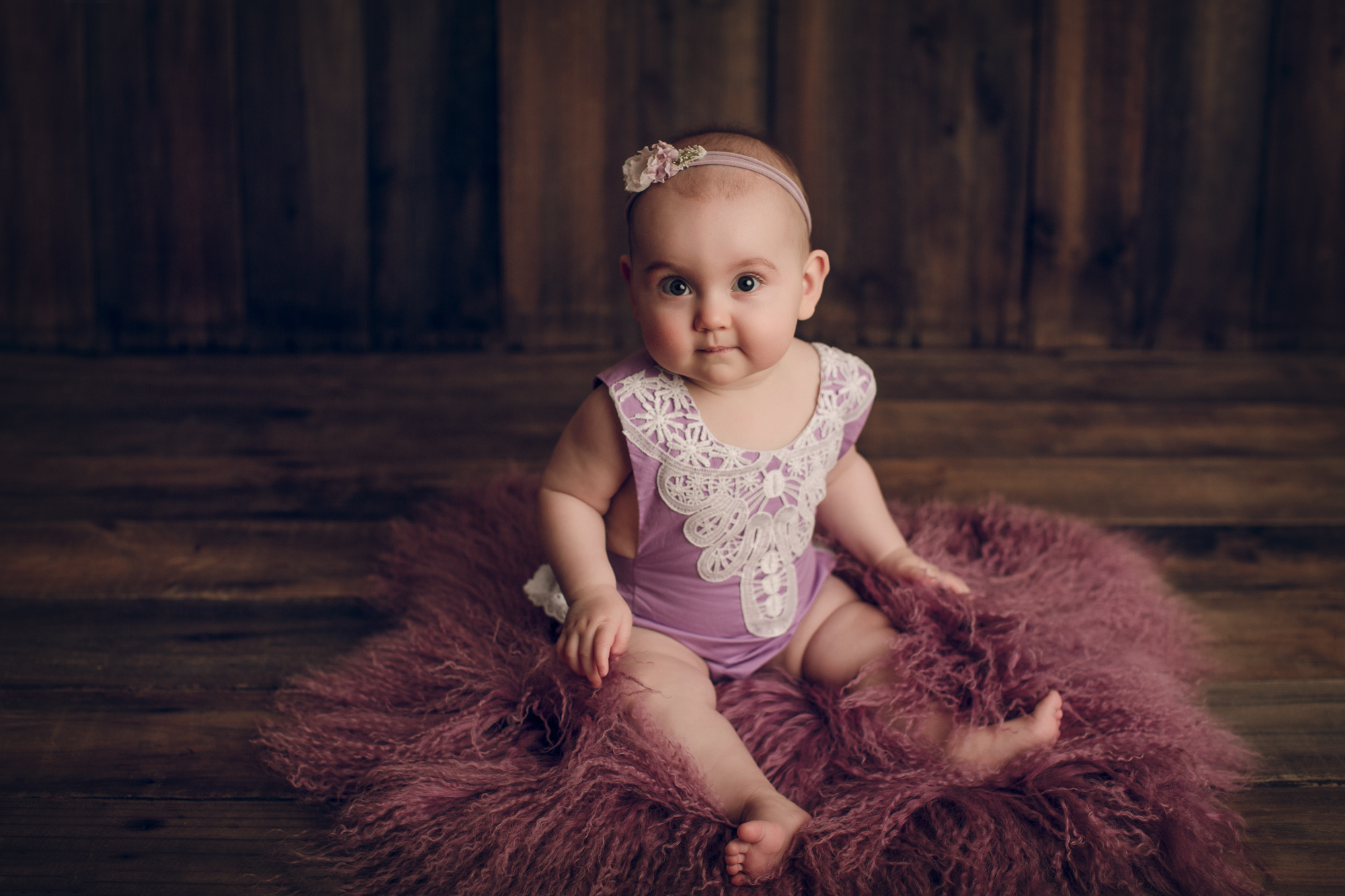 Adelaide newborn baby photographer's photo of an 8 month old baby girl.