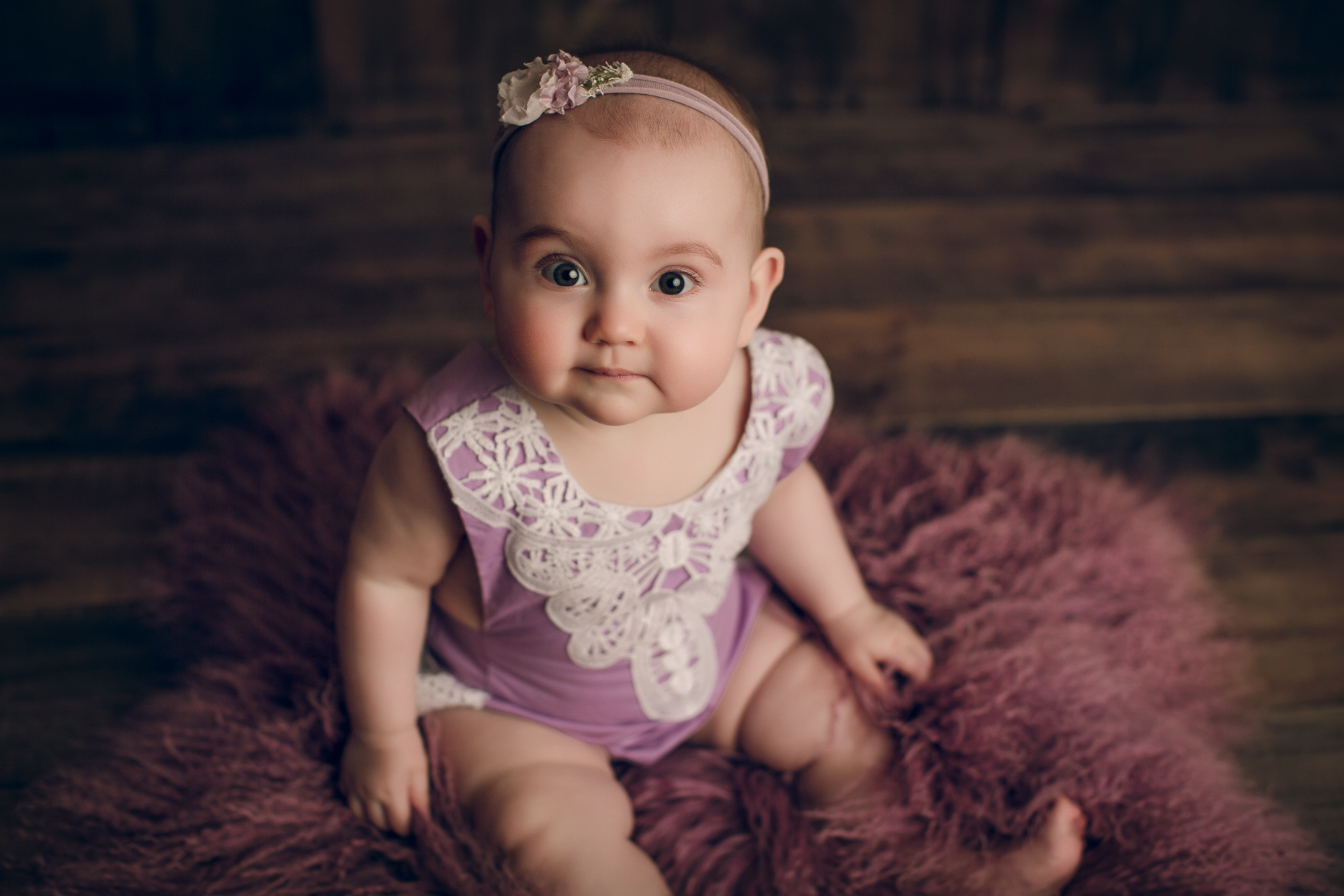 Adelaide newborn baby photographer's photo of an 8 month old baby girl.