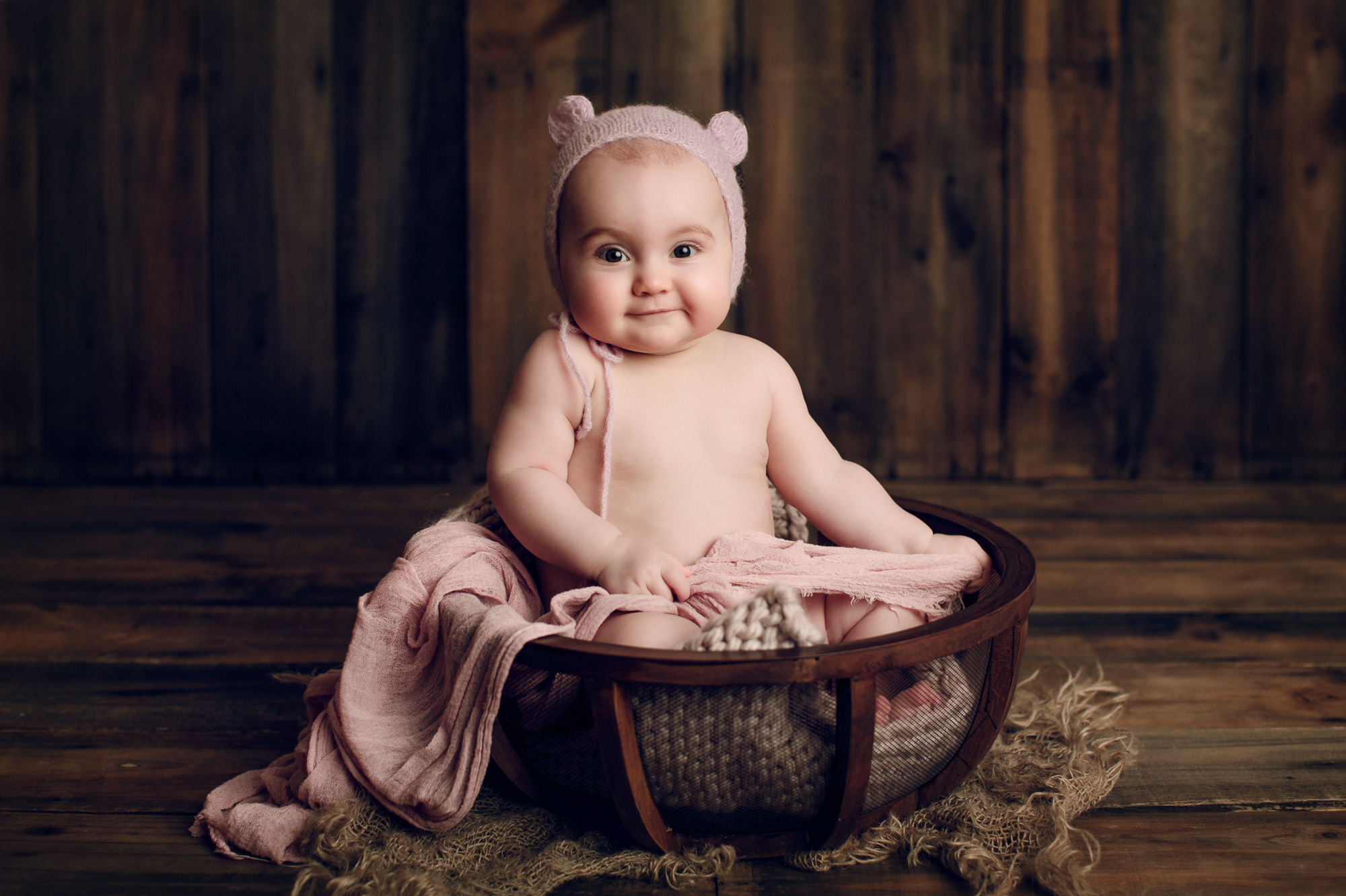 Adelaide newborn baby photographer's photo of an 8 month old baby girl.