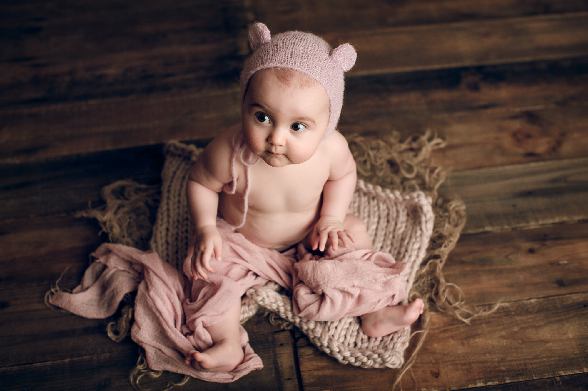 Adelaide newborn baby photographer's photo of an 8 month old baby girl.