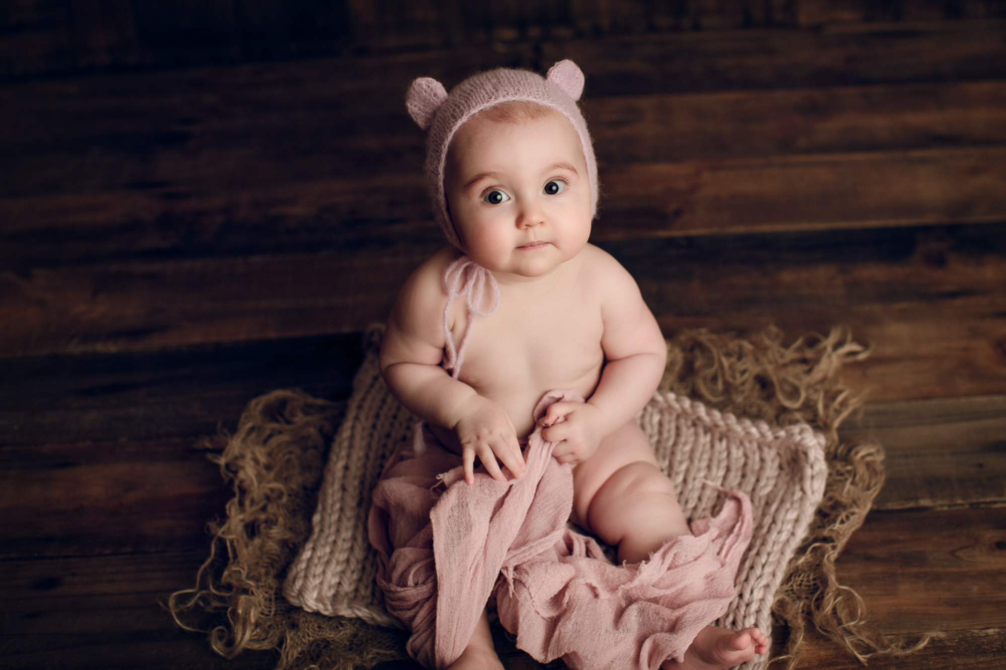 Adelaide newborn baby photographer's photo of an 8 month old baby girl.