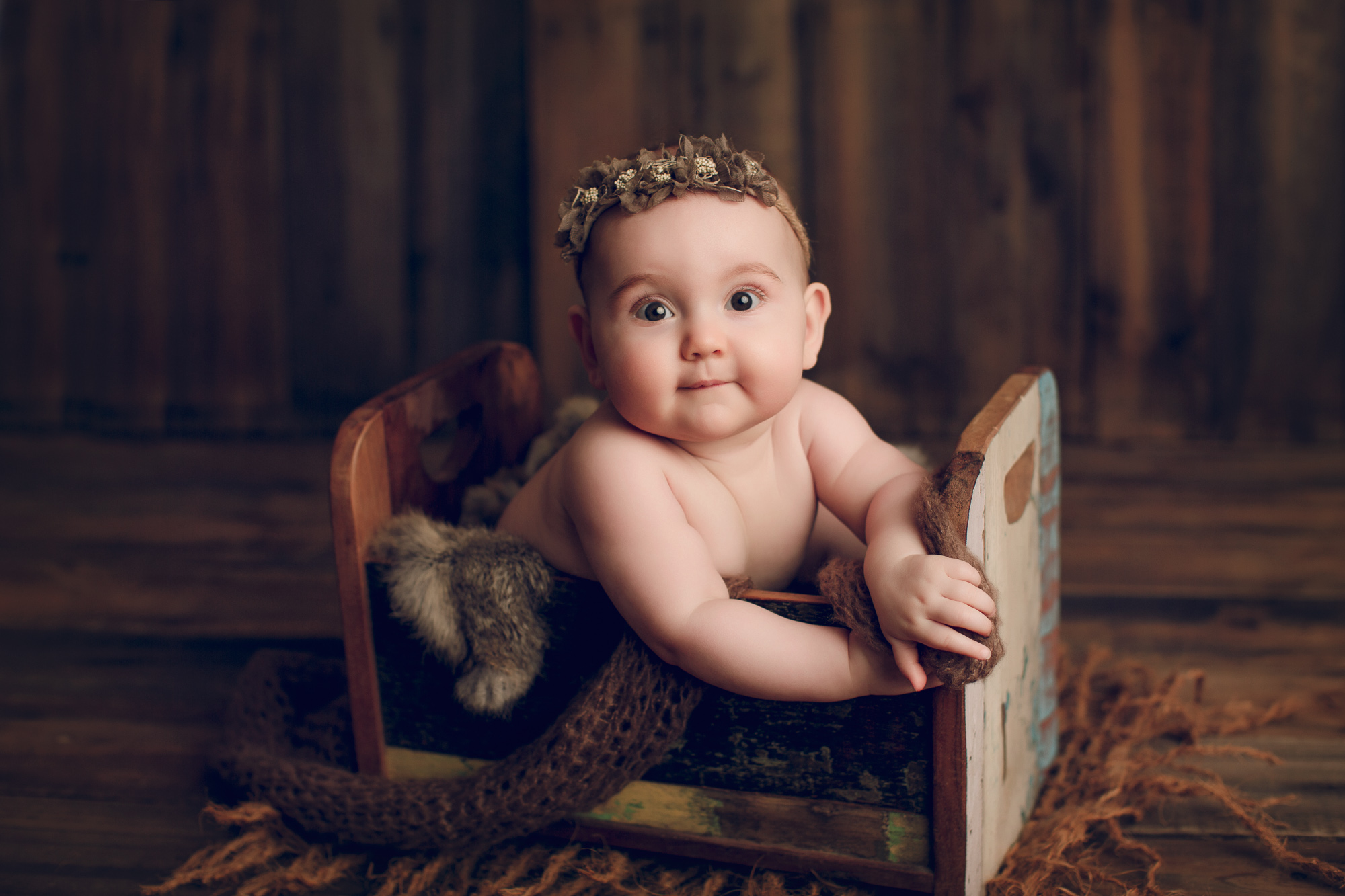 Adelaide newborn baby photographer's photo of an 8 month old baby girl.