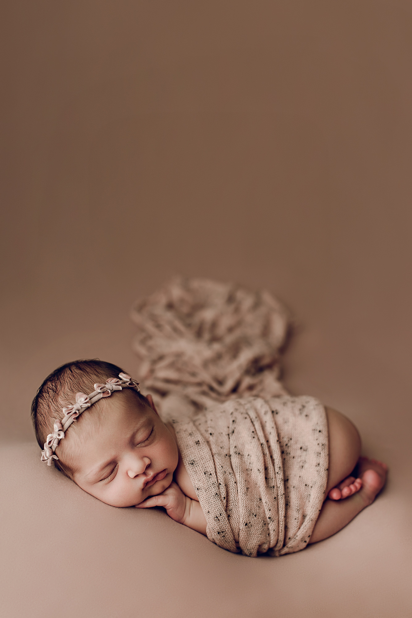 Adelaide newborn baby photographer's photo of a newborn baby girl.