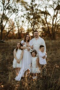 An Adelaide family of 6 at a photo shoot at sunset.