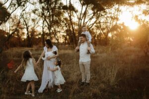 An Adelaide family of 6 at a photo shoot at sunset.