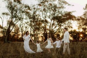 An Adelaide family of 6 at a photo shoot at sunset.