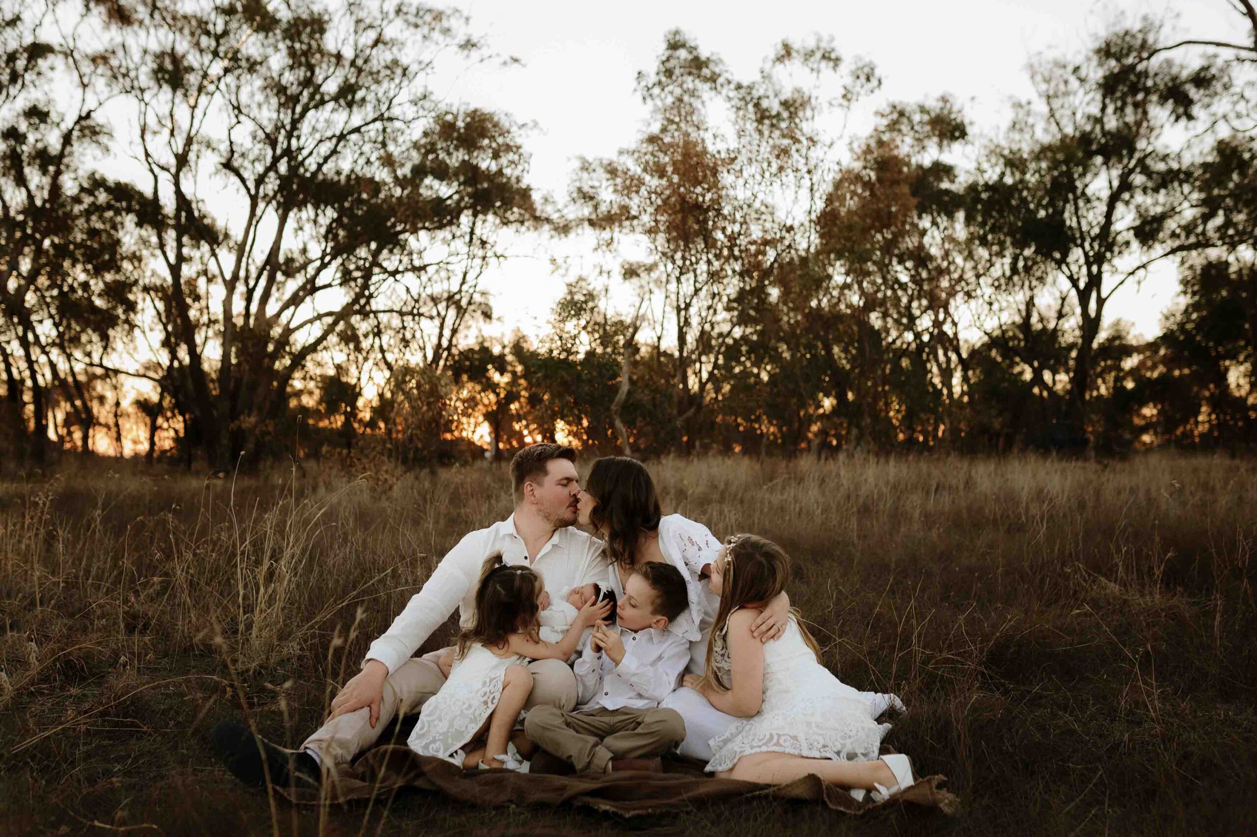 An Adelaide family of 6 at a photo shoot at sunset.