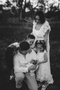 An Adelaide family of 6 at a photo shoot at sunset.