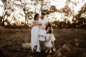 An Adelaide family of 6 at a photo shoot at sunset.