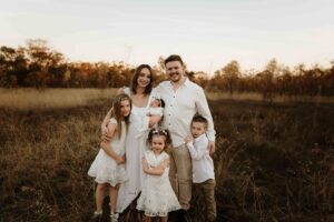 An Adelaide family of 6 at a photo shoot at sunset.