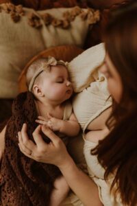 An Adelaide mum cuddling with her 12 week old baby girl.