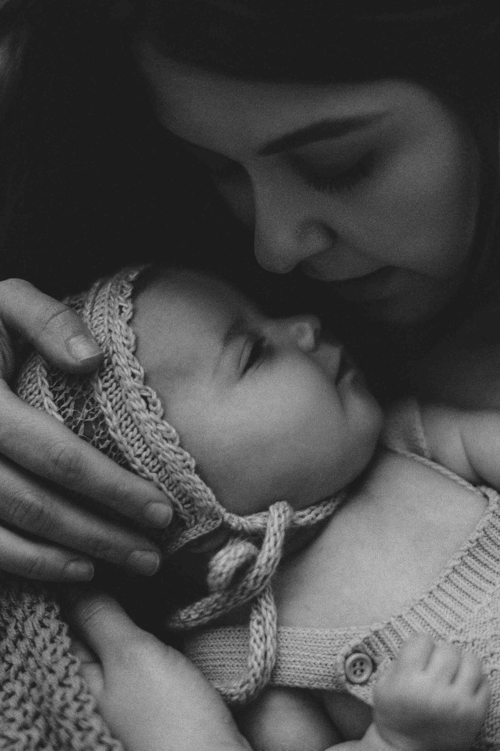 An Adelaide mum cuddling with her 12 week old baby girl.