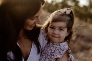 Adelaide family photographer capturing genuine parent and child connection.
