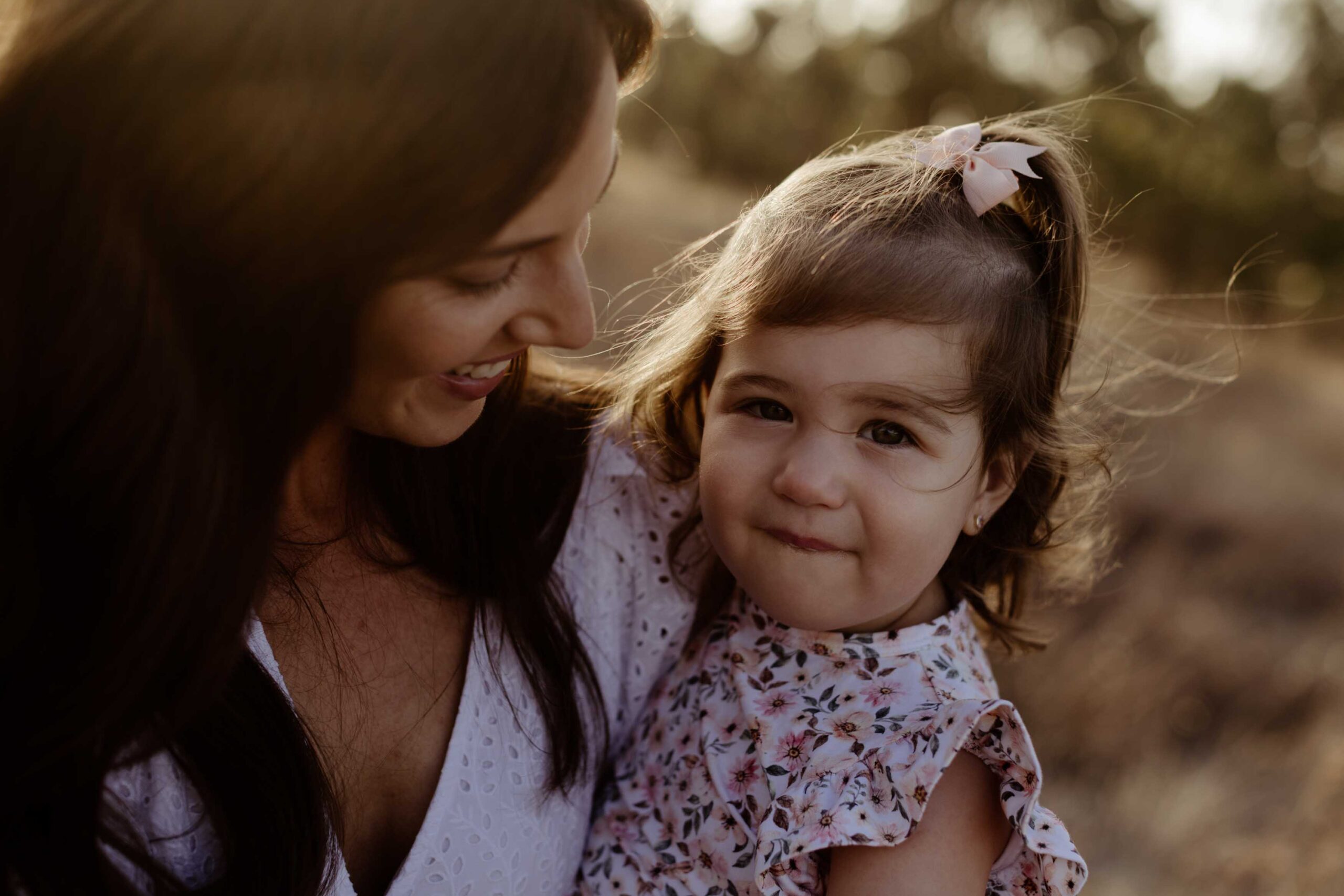 Adelaide family photographer capturing genuine parent and child connection.