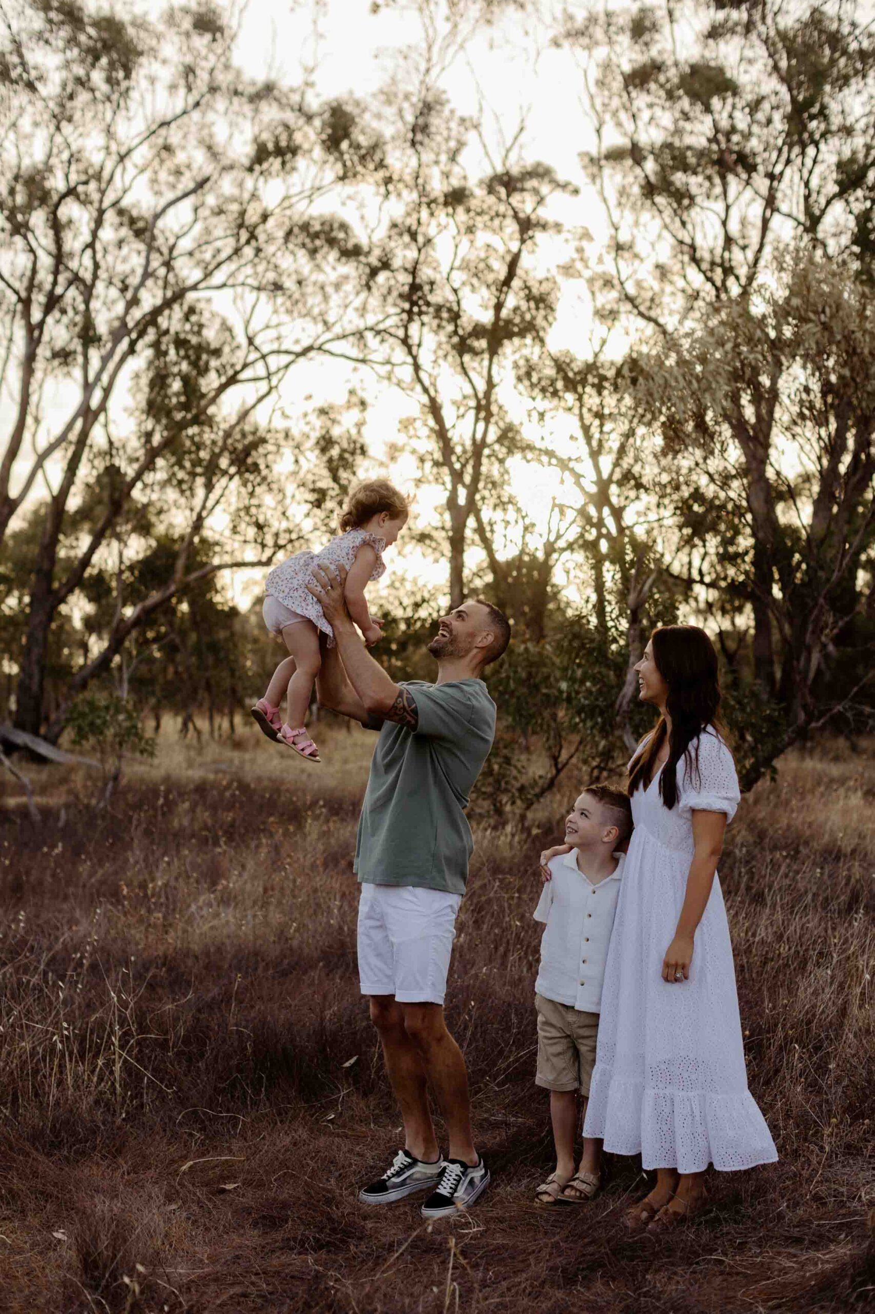 Natural outdoor family photography in Adelaide with parents and young children.