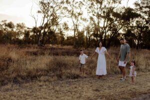 Candid sibling moments during an Adelaide family photography session.