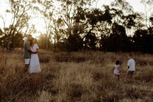 Candid sibling moments during an Adelaide family photography session.