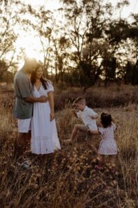 Outdoor family photography in Adelaide showing children playing naturally.