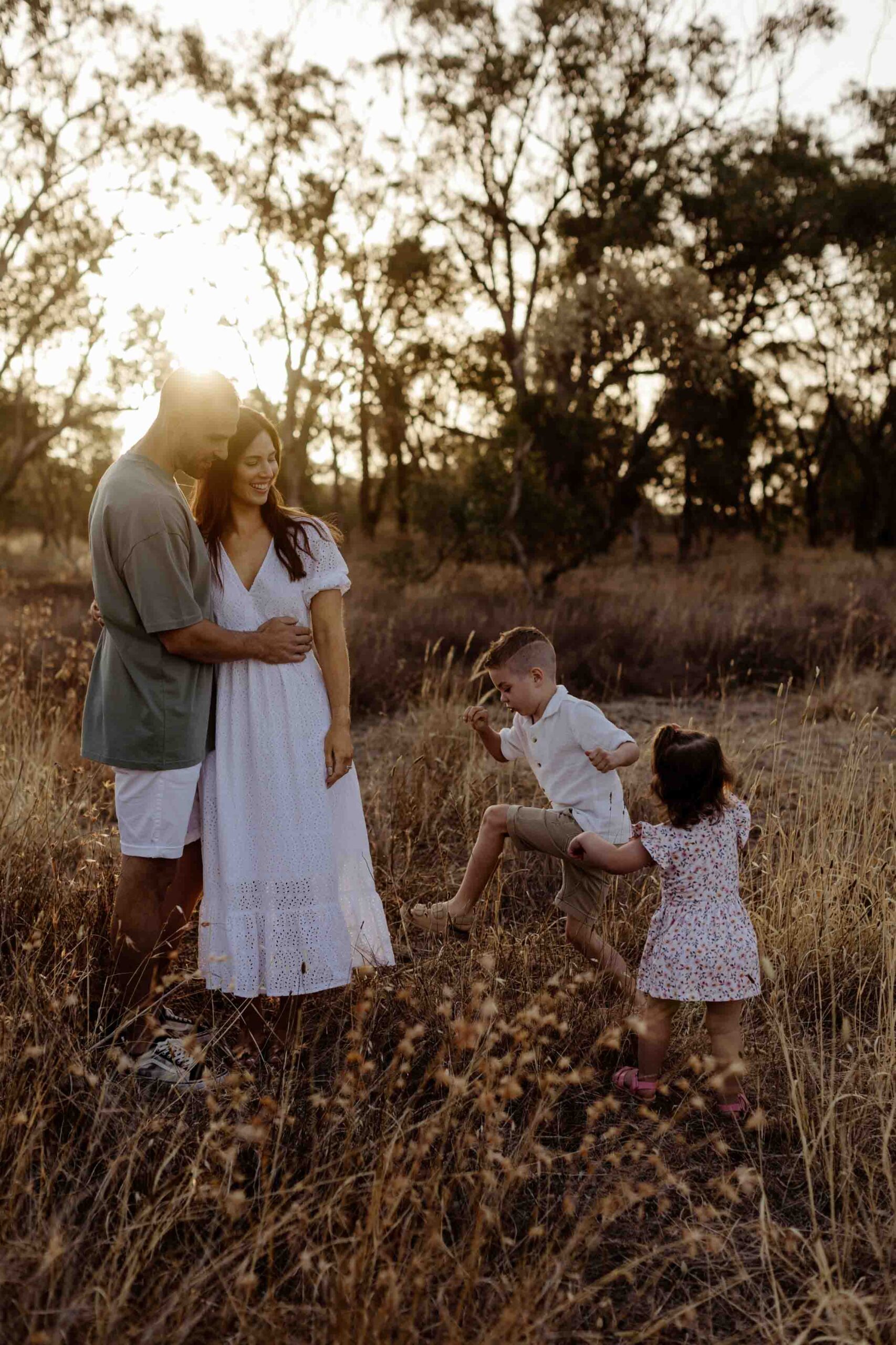 Outdoor family photography in Adelaide showing children playing naturally.