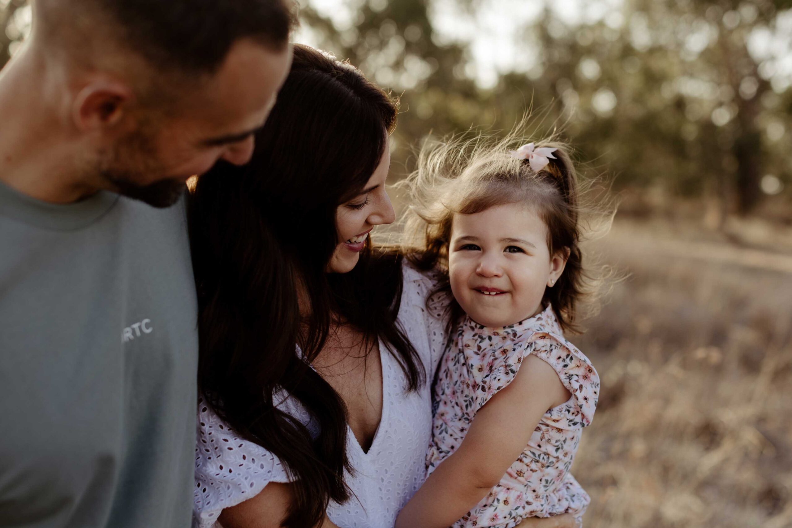 Adelaide family photographer capturing genuine parent and child connection.