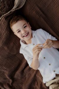 Relaxed child portrait in an Adelaide outdoor family session.