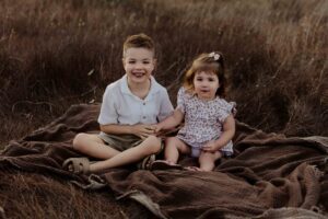 Outdoor family photography in Adelaide showing children playing naturally