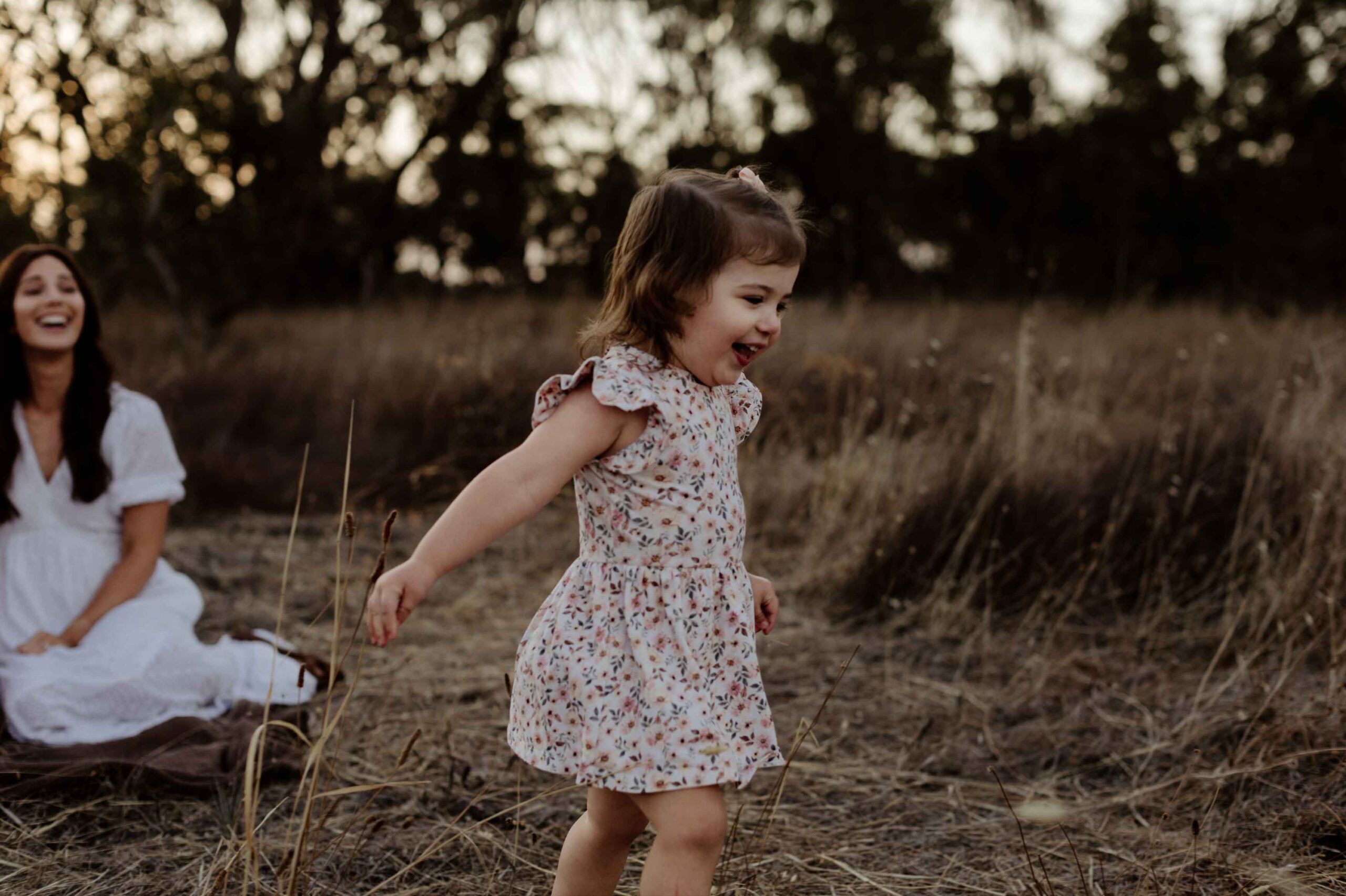 Outdoor family photography in Adelaide showing children playing naturally