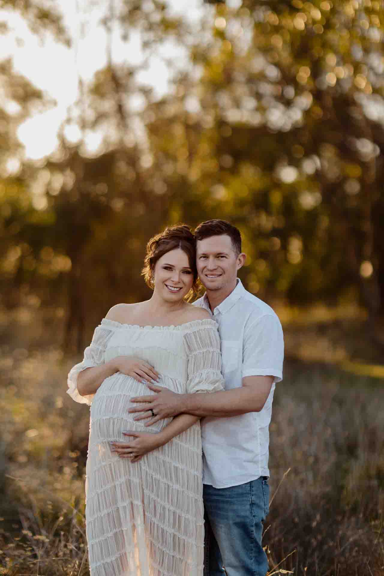 A pregnant mother and her partner at a maternity session in Adelaide.